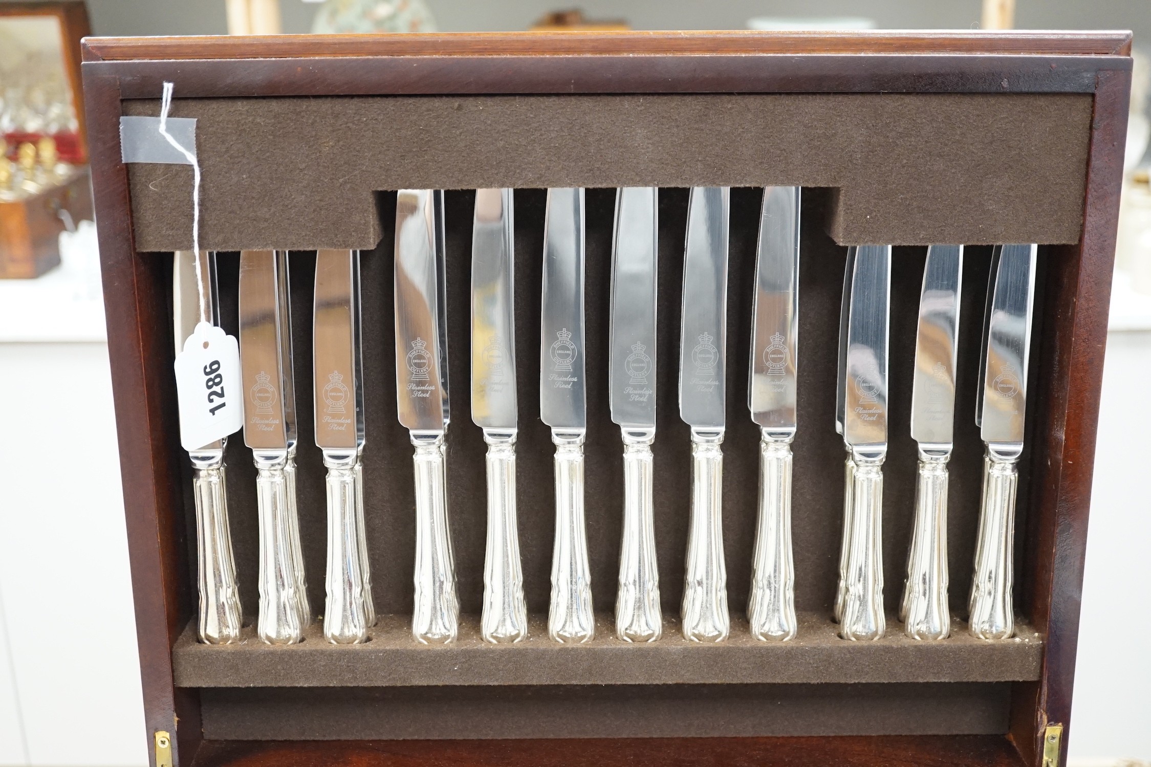 A silver plated two tier canteen of cutlery